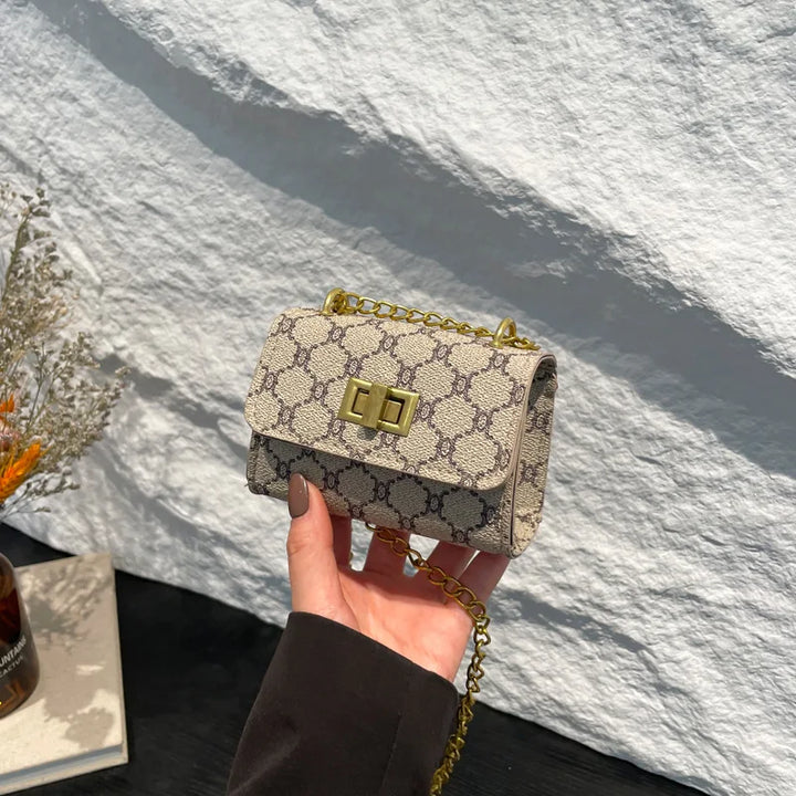 Stylish Mini Crossbody Bag with Geometric Pattern Faux Leather Buckle Closure Painted Edge Detail Faux Leather Lining Purse