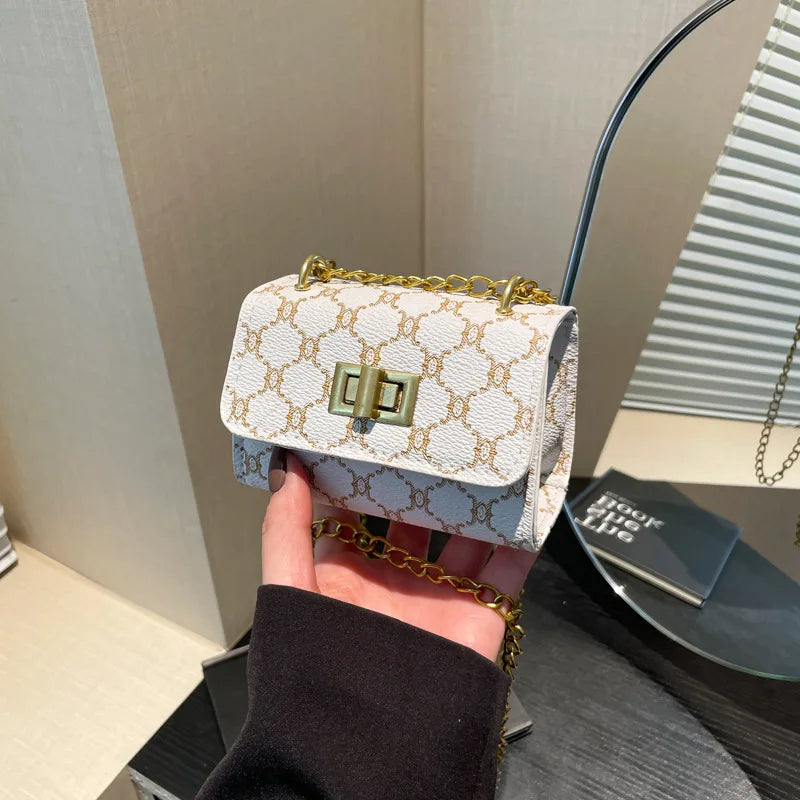 Stylish Mini Crossbody Bag with Geometric Pattern Faux Leather Buckle Closure Painted Edge Detail Faux Leather Lining Purse